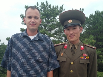 Brandon Cobb with KPA officer at the DMZ